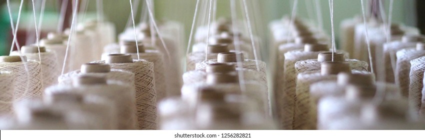 Textile threads industry . - Shutterstock ID 1256282821