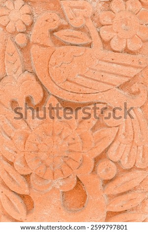 Texture with ancient drawings. Background with drawings on a clay slab.