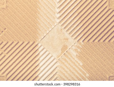 Texture of back side of ceramic tile for background. Toned.