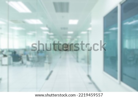 Texture background Abstract blur luxury image of footpath office Building Lobby with clear glass walls and door with light bokeh and flare light bulb. Modern interior. Defocused blurred background.