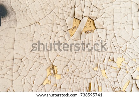 Texture background of bright yellow green and blue peeling paint