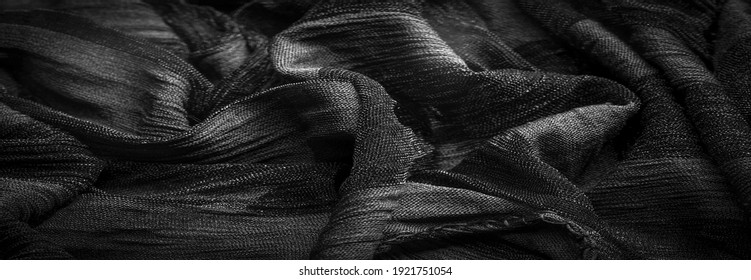 Texture, background, design, light transparent silk fabric in black and white, Soft-touch material is available in a rainbow of colors to blend with the latest developments of your projects