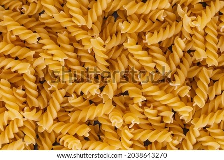texture background: eliche corkscrew shaped dired pasta top view  [[stock_photo]] © 