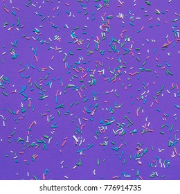 Texture Background Of Fashion Ultra Violet Color With Confetti.minimal Concept. Flat Lay, Top View. 