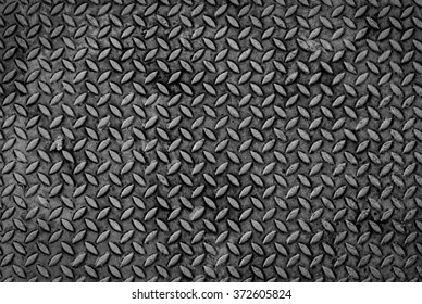 Texture Background Of Grungy Old Weathered  Metal Diamond Plate With Scratch And Dirty In Dark Tone