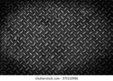 Texture Background Of Grungy Old Weathered  Metal Diamond Plate With Scratch And Dirty In Dark Tone