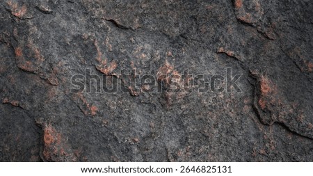 Texture background with the image of a gray granite rock with inclusions of red stone. Can be used for wallpaper, design                            