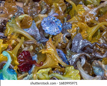 Texture, Background. Many Small Various Blown Glass Objects With Beautiful Color