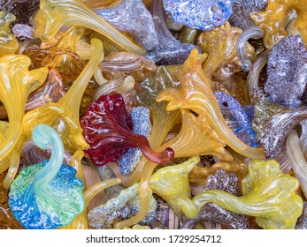 Texture, Background. Many Small Various Blown Glass Objects With Beautiful Color