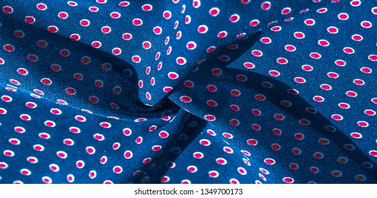 Texture background, pattern, blue silk fabric with red polka dots. Light and silky-soft satin pendant is perfect for your design, online projects.