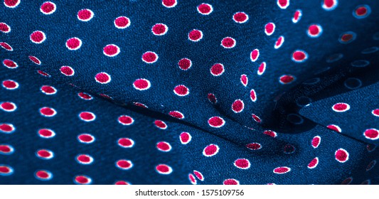 Texture background, pattern, blue silk fabric with red polka dots. Light and silky-soft satin pendant is perfect for your design, online projects. It is also perfect for screensavers and wallpapers.