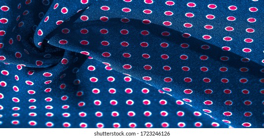 Texture background, pattern, blue silk fabric with red polka dots. Light and silky-soft satin pendant is perfect for your design, online projects. It is also perfect for screensavers and wallpapers.