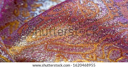 Texture background, pattern. pink brocade fabric. Organza brocade fabric - shepherd, with a crunchy palm. It has a large yarn-dyed flower embroidered pattern throughout.