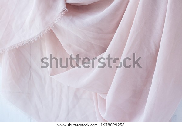 Texture background pattern. Pink silk fabric.\
Vintage French semi sheer crepe de chine fabric in a stunning\
lipstick pink color It is heavier weight than the very sheer\
chiffon but is still semi\
sheer