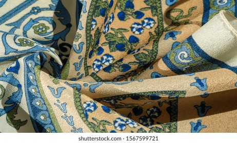 Texture background pattern postcard, silk fabric, moderate calm colors, royal monogram pattern, blue steel green brown colors on fabric. your design will be steeped in the spirit of the Middle Ages