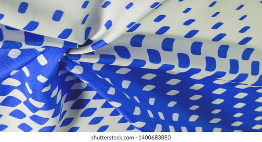 texture background pattern. silk fabric with a pattern of blue squares on a white background. 