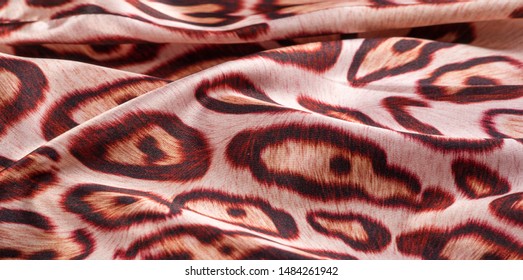 texture, background, pattern. silk fabric, tiger skin, light and silky soft, this atlas charmeuse is perfect for your projects - especially on bias. Colors include tan, black and brown.
