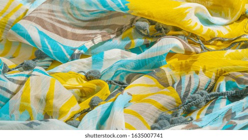 texture background pattern. Silk fabric with colored lace. Yellow blue and gray-blue shades. It is perfect for your design, accents, wallpapers, posters and postcards. Your possibilities are endless