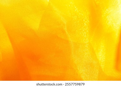 Texture, background, pattern. Silk fabric in golden yellow as background. abstract folds.
Smooth elegant color silk or satin texture. lemon sunflower daffodil banana corn butter canary gold dandelion 