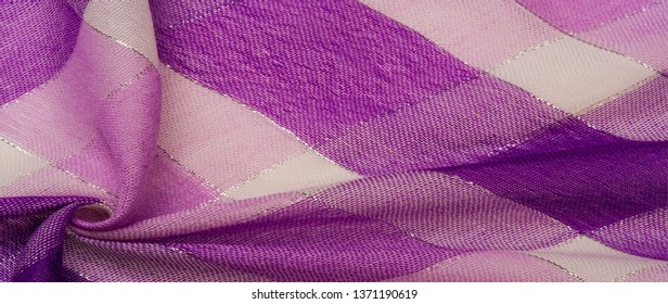 Texture background pattern silk scarf female blue in color with a metal stripe. The scarf is decorated with a delicate patchwork pattern in pastel shades of abstract Scotlandor motifs checked fabric