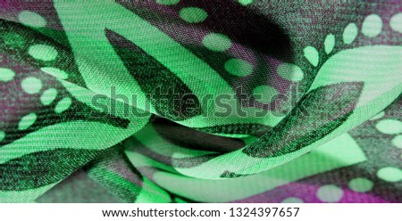 texture background pattern wallpaper. Green pink black silk fabric pattern. This medium-weight rayon fabric has a nice shine with slight color variations. Perfect for adding elegance to your designs