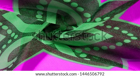 texture background pattern wallpaper. Green pink black silk fabric pattern. This medium-weight rayon fabric has a nice shine with slight color variations. Perfect for adding elegance to your designs