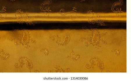 Texture background pattern Yellow mustard brown chiffon fabric with paisley print High quality pure silk chiffon fabric bright beautiful color combinations This fabric is suitable for design wallpaper