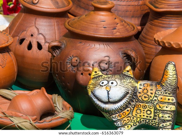 Texture,\
background. Pottery. pots, dishes, and other articles made of\
earthenware or baked clay. Pottery can be broadly divided into\
earthenware, porcelain, and\
stoneware.