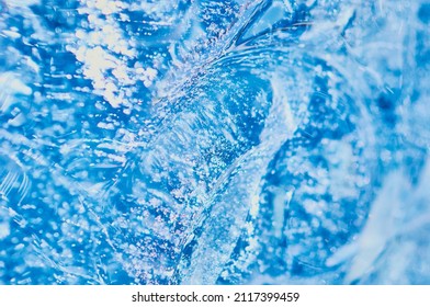 Texture Background Of Pure Natural Water Concept. Drinking Water. Selective Focus. Wave, Whirlpool And Splash. Place To Insert An Inscription Or Logo.