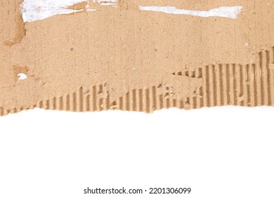 Texture Background. Ripped Piece Of Cardboard Isolated On White Background. Cardboard With Torn Edges, Top View.