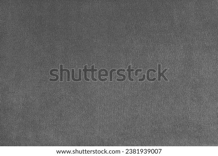 Texture background of velours gray fabric. Upholstery texture fabric, velvet furniture textile material, design interior, decor. Fleecy fabric texture close up, backdrop, wallpaper.