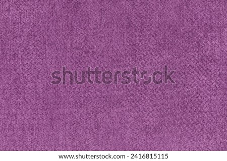 Texture background of velours jacquard pink fabric. Upholstery texture fabric, velvet furniture textile material, design interior, decor. Fleecy fabric texture close up, backdrop, wallpaper.