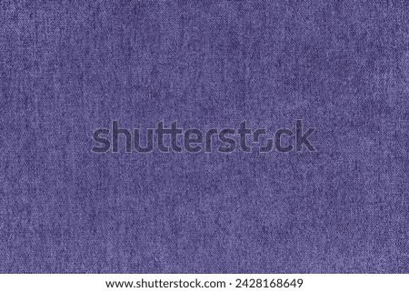 Texture background of velours jacquard pueple fabric. Upholstery texture fabric, velvet furniture textile material, design interior, decor. Fleecy fabric texture close up, backdrop, wallpaper.