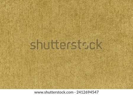 Texture background of velours jacquard yellow fabric. Upholstery texture fabric, velvet furniture textile material, design interior, decor. Fleecy fabric texture close up, backdrop, wallpaper.