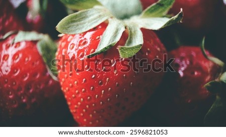 Texture or background.Selective focusing of ripe red strawberries in close-up. Macrophotography