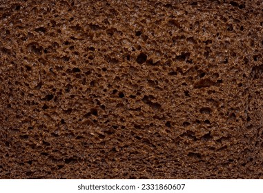 Texture of baked rye bread. Close up