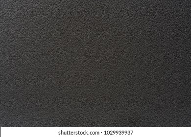 The texture of a black chalkboard. The background of black cloth. space for text.