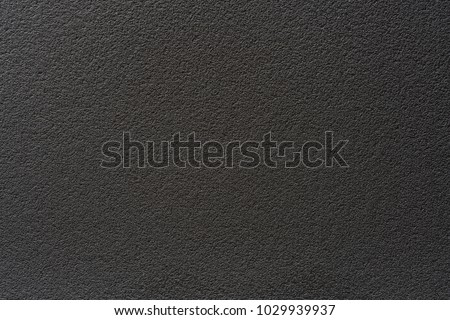The texture of a black chalkboard. The background of black cloth. space for text.