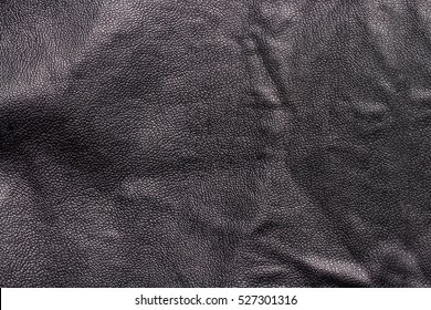 Texture Of Black Leather On The Back Of A Black Leather Jacket