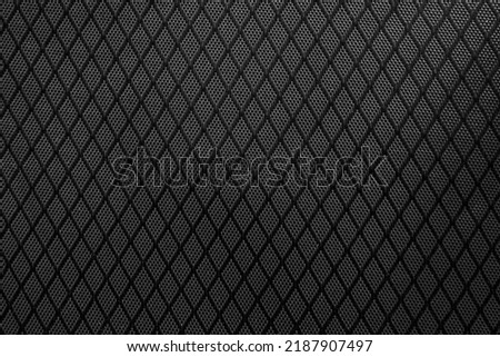 Texture of black mesh fabric. fine mesh material