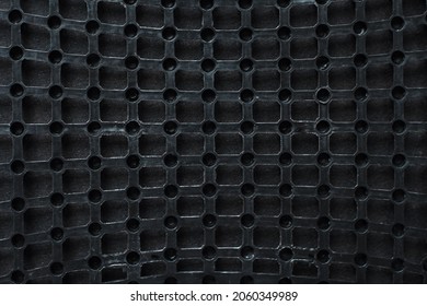 Texture: black metal iron grating, grid or stainless steel grate. Venting, ventilation with geometric design pattern
