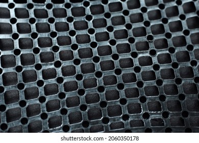 Texture: black metal iron grating, grid or stainless steel grate. Venting, ventilation with geometric design pattern