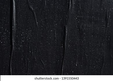 texture of black plastered wall poster, creative paper background idea