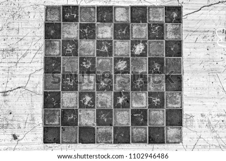 the texture black and white background of the dirty chessboard design on tile table