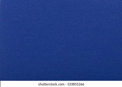 Texture of blue color a brushed paper sheet for blank and pure backgrounds. High quality texture in extremely high resolution
