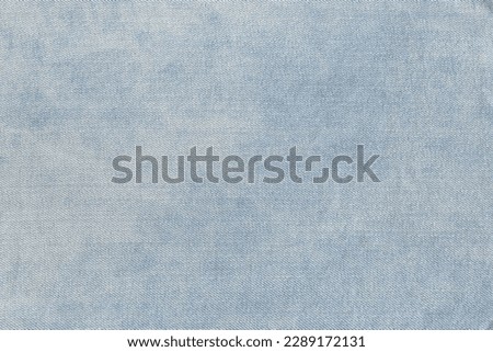 texture of blue denim fabric. textured background closeup