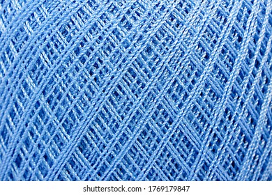 Texture of blue thread in spool