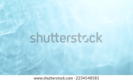 Texture of blue water surface in pool. Abstract backgound with texture.