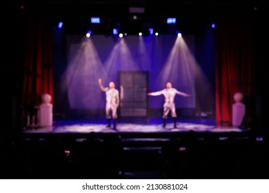 Texture blur and defocus, background for design. Stage light at a concert show. Artists perform on scene in light and smoke.