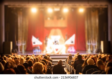 Texture blur and defocus, background for design. Stage light at a concert show. Artists perform on scene in light and smoke.